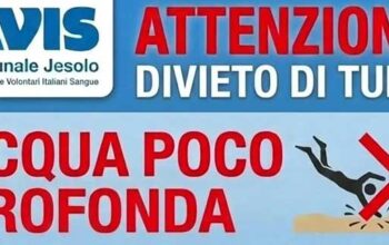 Locandina della campagna Avis Jesolo contro i tuffi pericolosi dai pontili con la scritta Tuffati nella solidarietà non nel pericolo.