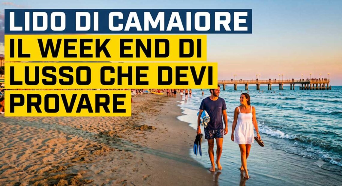 Coppia che passeggia sulla spiaggia di Lido di Camaiore con vista sul pontile