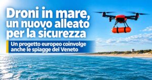 Drone attrezzato con galleggiante arancione per il salvataggio in mare durante una perlustrazione sulla spiaggia.