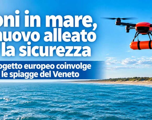 Drone attrezzato con galleggiante arancione per il salvataggio in mare durante una perlustrazione sulla spiaggia.