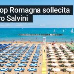 Testo "Lega Coop Romagna sollecita il ministro Salvini" sovrapposto a una foto aerea di una spiaggia organizzata con ombrelloni.