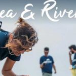 Volontari di Plastic Free Sardegna impegnati nella raccolta di rifiuti sulla spiaggia per l'evento Sea & Rivers