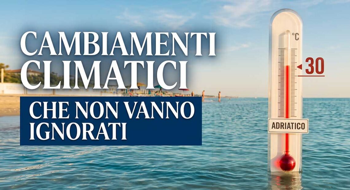 Termometro immerso nel mare Adriatico che segna 30 gradi vicino alla spiaggia.